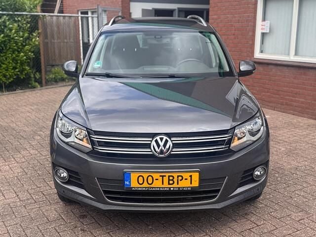 Grijs Gebruikt 2012 VW Tiguan Sport SUV | € 7.499 (Goede deal) - Afbeelding 1/4