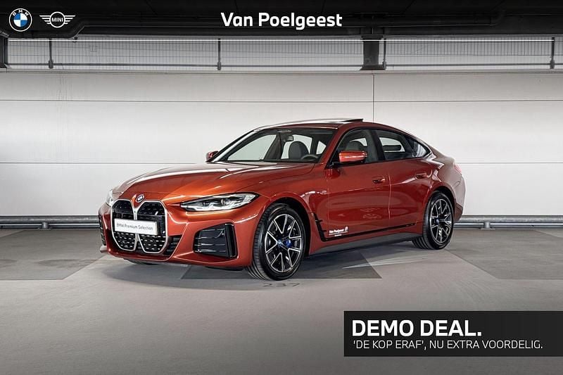 Oranje Gebruikt 2024 BMW i4 Executive Sedan | € 51.900 (Eerlijke prijs) - Afbeelding 1/4