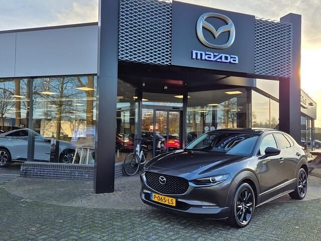 Machine grey Gebruikt 2022 Mazda CX-30 Homura-Line SUV | € 27.950 (Eerlijke prijs) - Afbeelding 1/1
