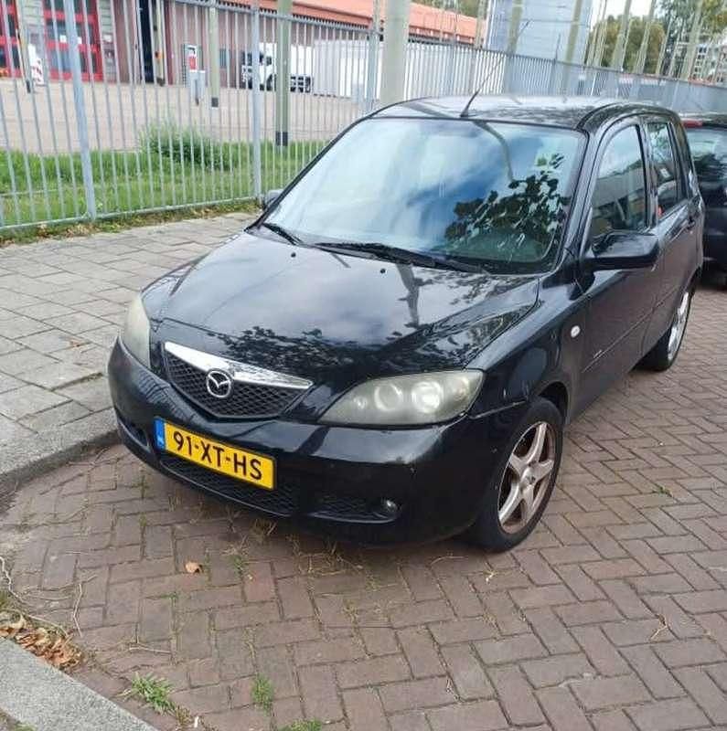 Zwart Gebruikt 2007 Mazda 2 Exclusive Stationwagen | € 800 (Super prijs) - Afbeelding 1/4