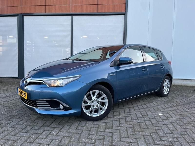 Blauw (metallic) Occasion 2016 Toyota Auris Hybrid Comfort Hatchback | € 9.999 (Super prijs) - Afbeelding 1/4