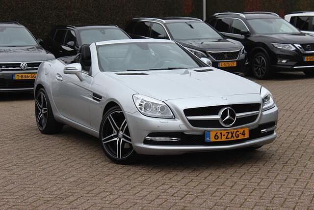 Grijs Occasion 2012 Mercedes SLK200 Cabriolet | € 19.950 (Eerlijke prijs) - Afbeelding 1/4