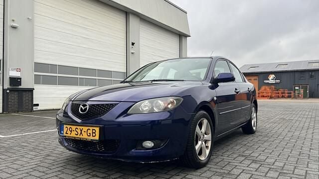 Blauw Gebruikt 2006 Mazda 3 Inclusive Sedan | € 3.750 (Eerlijke prijs) - Afbeelding 1/4
