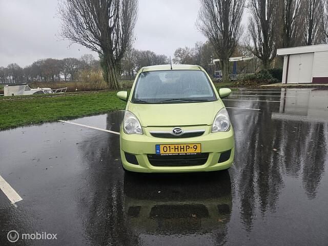 Occasion Daihatsu Cuore 69 PK (50 kW) 2009 Groen Hatchback