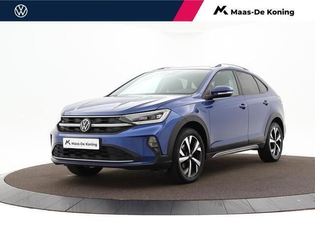 Blauw Gebruikt 2022 VW Taigo Style SUV | € 22.740 (Goede deal) - Afbeelding 1/4
