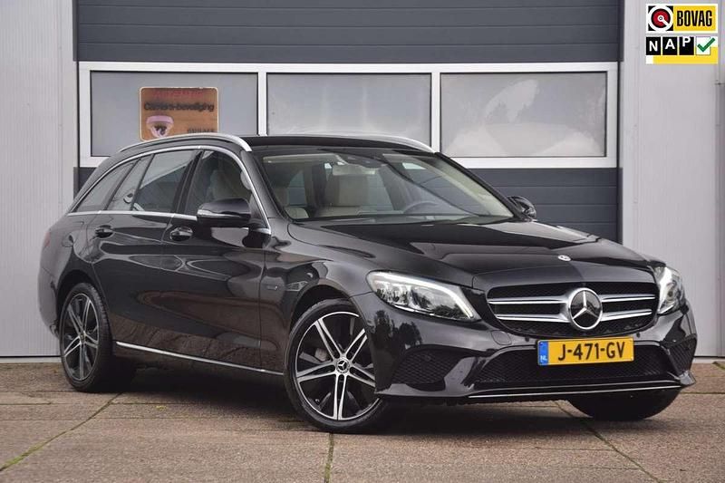 Zwart Gebruikt 2020 Mercedes C300e Business Stationwagen | € 31.950 (Goede deal) - Afbeelding 1/4
