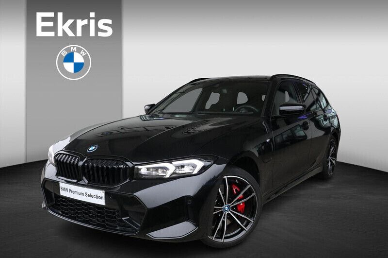 Zwart, metallic lak Gebruikt 2024 BMW 320e M Sport Stationwagen | € 46.950 (Eerlijke prijs) - Afbeelding 1/4