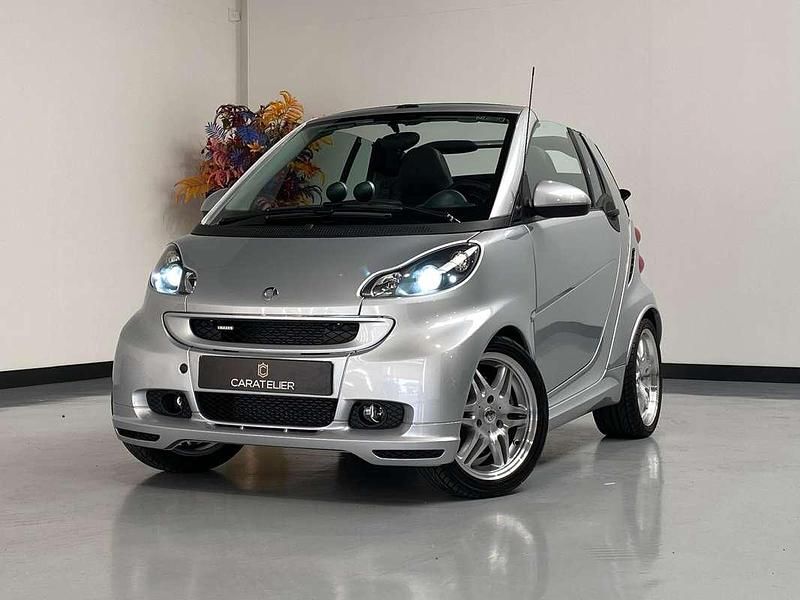 Grijs, metallic lak Gebruikt 2009 Smart ForTwo Cabrio Brabus Xclusive Cabriolet | € 14.900 - Afbeelding 1/4