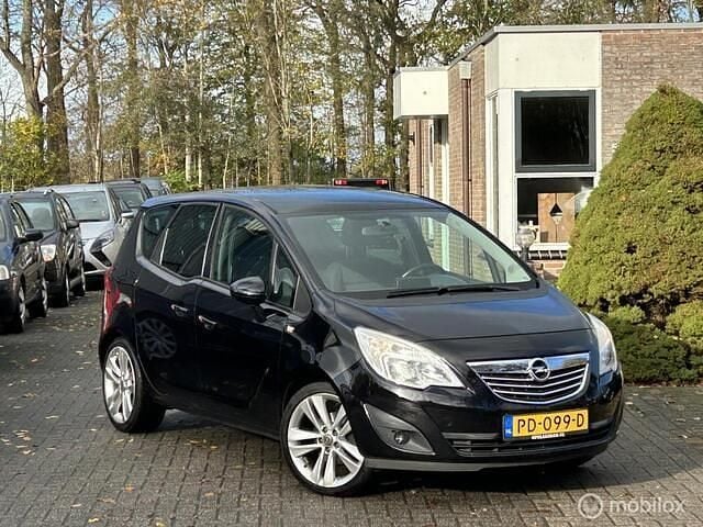 Zwart (metallic) Gebruikt 2010 Opel Meriva Cosmo MPV | € 2.999 (Goede deal) - Afbeelding 1/4