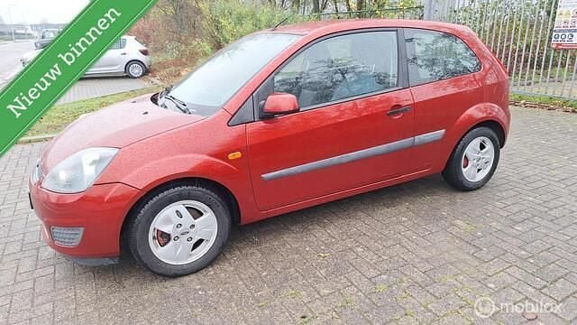 Oranje Gebruikt 2006 Ford Fiesta Style Hatchback | € 1.295 (Goede deal) - Afbeelding 1/4