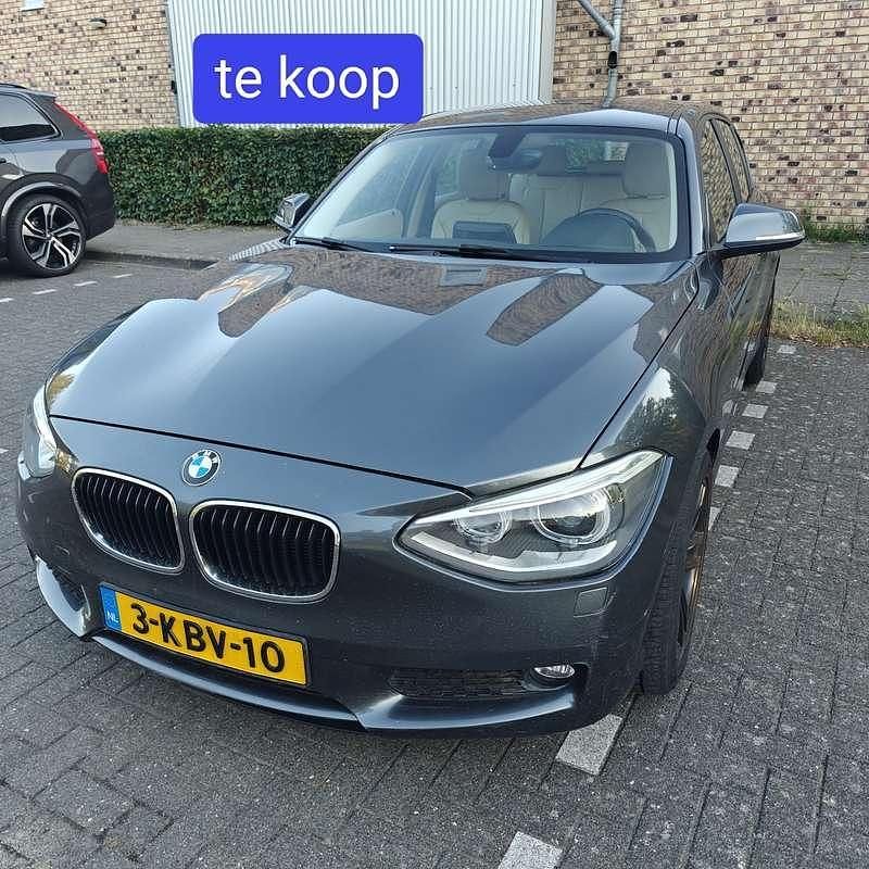 Grijs Gebruikt 2013 BMW 116 Hatchback | € 6.500 (Goede deal) - Afbeelding 1/4