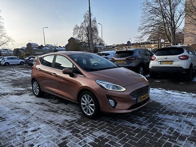 Occasion Ford Fiesta Titanium 101 PK (74 kW) 2017 Oranje Hatchback