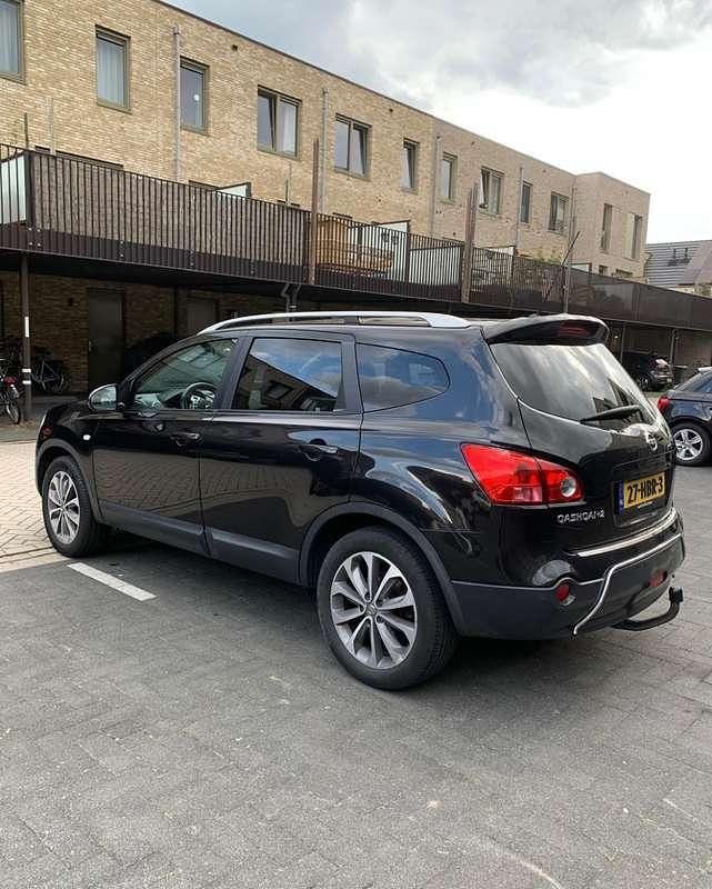 Zwart Occasion 2009 Nissan Qashqai +2 Tekna SUV | € 5.900 (Eerlijke prijs) - Afbeelding 1/4