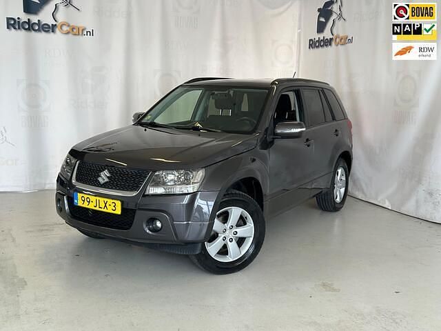Grijs Gebruikt 2009 Suzuki Grand Vitara Exclusive SUV | € 7.499 - Afbeelding 1/4