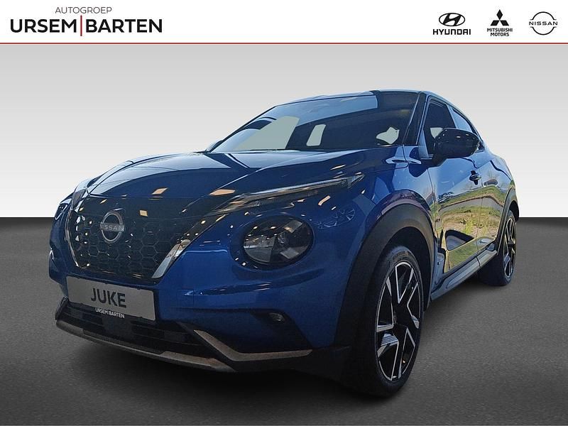 Magnetic blue met zwart dak (blauw metallic) Nieuw 2025 Nissan Juke Pack SUV | € 35.430 (Eerlijke prijs) - Afbeelding 1/4