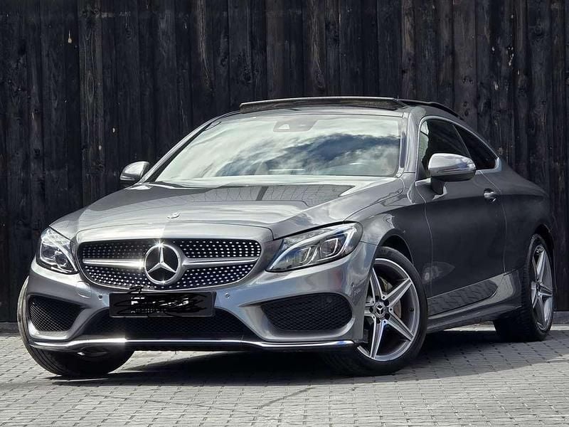 Grijs Gebruikt 2018 Mercedes C180 AMG line Coupé | € 27.000 (Eerlijke prijs) - Afbeelding 1/4