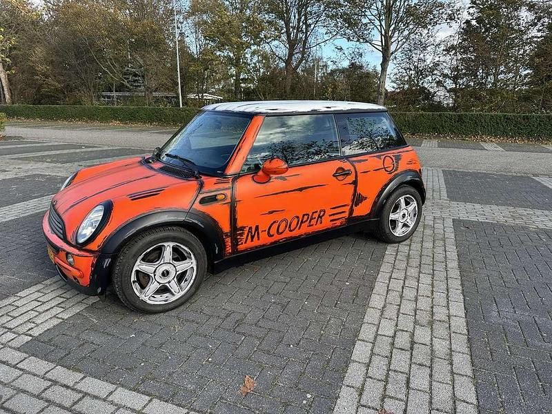 Oranje Gebruikt 2002 Mini Cooper Pepper Hatchback | € 1.750 (Eerlijke prijs) - Afbeelding 1/4