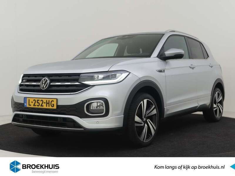 Zilver Gebruikt 2021 VW T-Cross R-line SUV | € 22.400 (Iets duurder) - Afbeelding 1/4