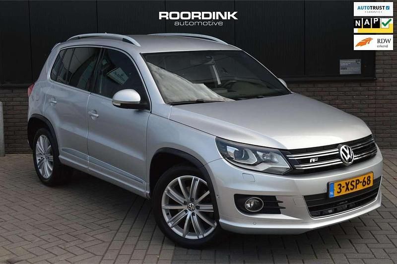 Grijs Gebruikt 2014 VW Tiguan R-line SUV | € 15.950 (Super prijs) - Afbeelding 1/4