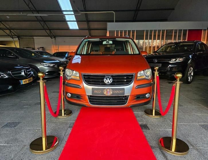 Oranje Gebruikt 2007 VW Touran Cross Edition MPV | € 4.444 - Afbeelding 1/3