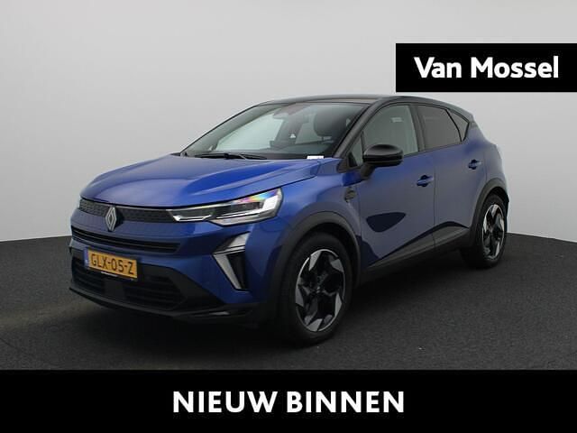 Ironblauw met dak in sterzwart Gebruikt 2024 Renault Captur Techno SUV | € 28.940 (Iets duurder) - Afbeelding 1/4