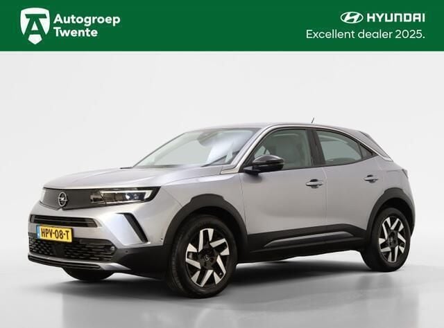 Grijs Gebruikt 2024 Opel Mokka Elegance SUV | € 23.950 (Eerlijke prijs) - Afbeelding 1/4
