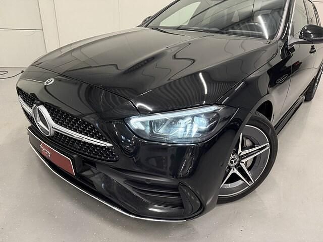 Occasion Mercedes C300 AMG line 2022 Zwart (metallic) Stationwagen