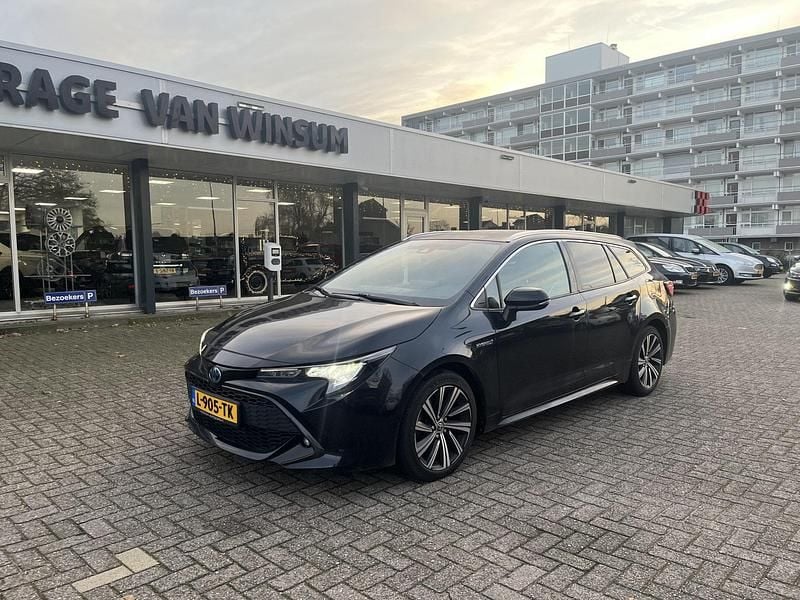 Zwart Gebruikt 2021 Toyota Corolla Stationwagen | € 23.450 (Goede deal) - Afbeelding 1/4