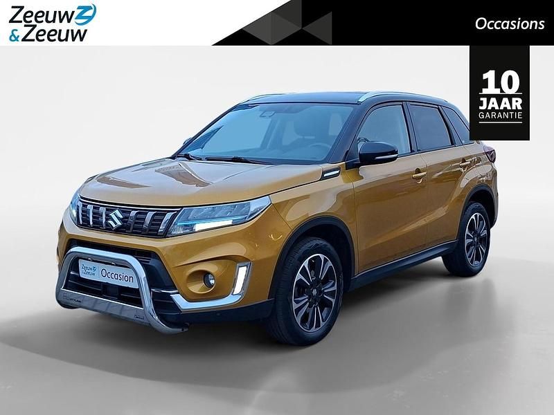 Solar yellow Occasion 2023 Suzuki Vitara Comfort SUV | € 22.945 (Eerlijke prijs) - Afbeelding 1/4