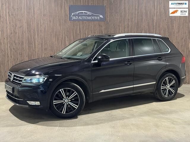 Zwart Gebruikt 2017 VW Tiguan Highline SUV | € 22.900 (Eerlijke prijs) - Afbeelding 1/4