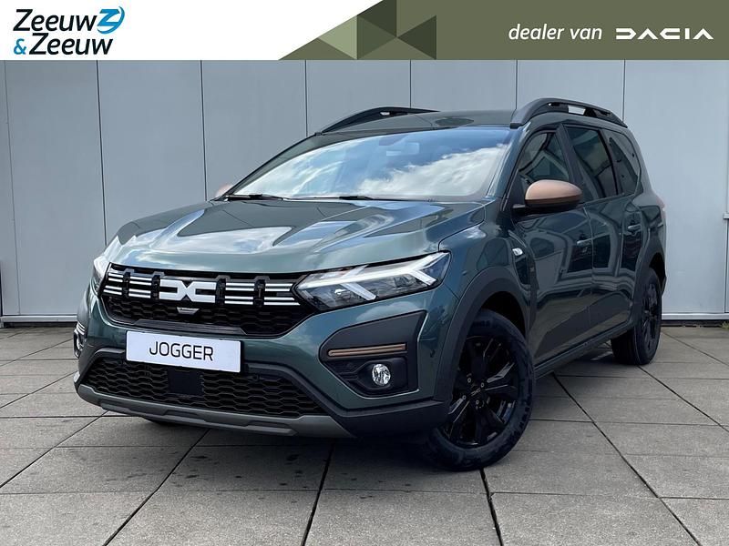Groen, metallic lak Gebruikt 2023 Dacia Jogger Extreme MPV | € 29.195 - Afbeelding 1/4