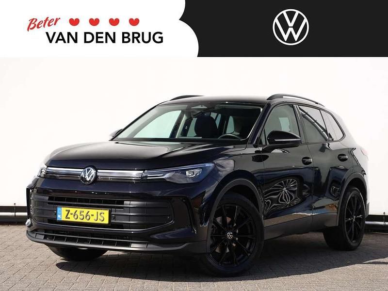 Zwart Gebruikt 2024 VW Tiguan SUV | € 39.800 (Eerlijke prijs) - Afbeelding 1/4