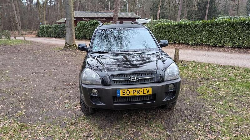 Zwart Occasion 2004 Hyundai Tucson Dynamiq SUV | € 2.000 (Goede deal) - Afbeelding 1/4