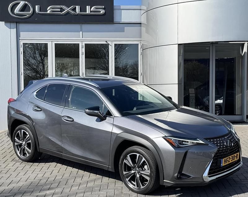 Grijs, metallic lak Gebruikt 2020 Lexus UX 250h Business Edition SUV | € 26.700 (Super prijs) - Afbeelding 1/4