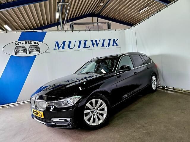 Zwart Gebruikt 2013 BMW 316 Executive Stationwagen | € 9.450 (Eerlijke prijs) - Afbeelding 1/4