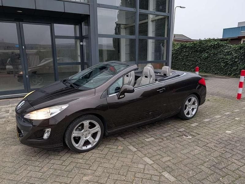Bruin Gebruikt 2010 Peugeot 308 CC Cabriolet | € 6.975 (Iets duurder) - Afbeelding 1/4