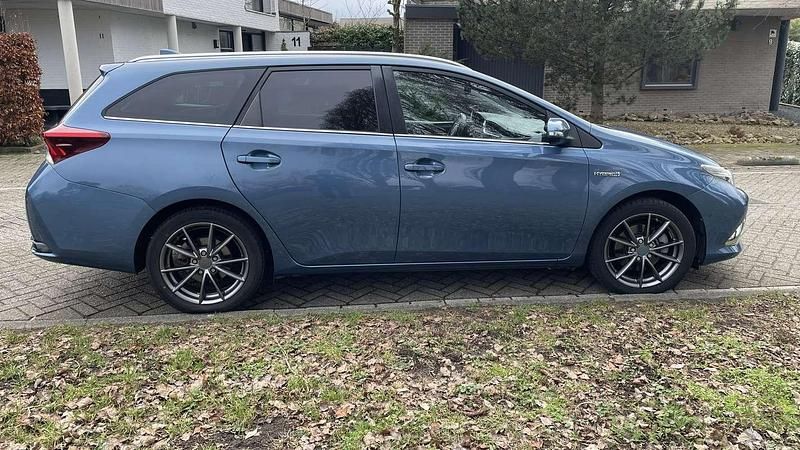 Occasion Toyota Auris Hybrid 136 PK (100 kW) 2015 Blauw Stationwagen