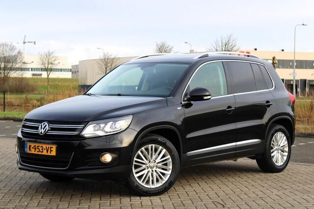 Zwart Gebruikt 2014 VW Tiguan Sport SUV | € 14.450 (Eerlijke prijs) - Afbeelding 1/4