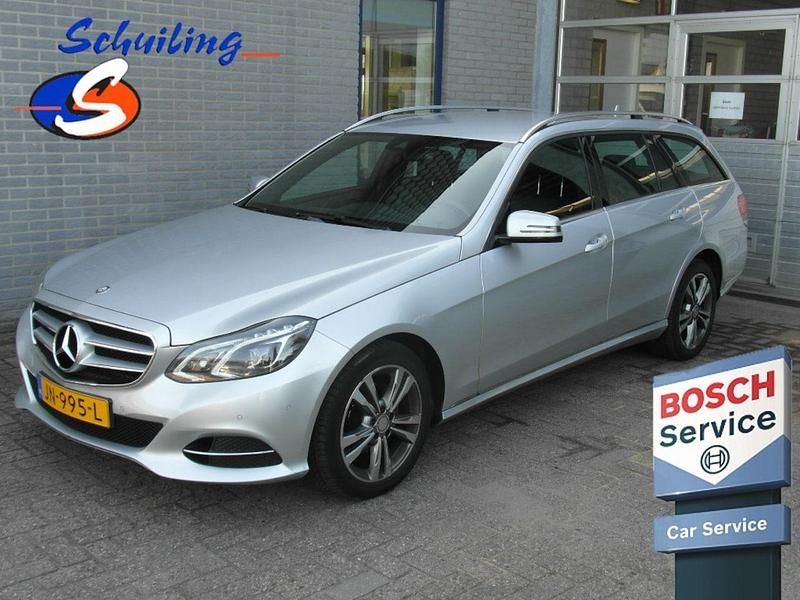 Grijs, metallic lak Gebruikt 2015 Mercedes E220 Avantgarde Stationwagen | € 9.990 (Eerlijke prijs) - Afbeelding 1/4