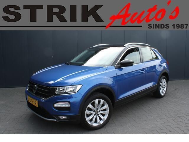 Blauw, metallic lak Gebruikt 2021 VW T-Roc Business SUV | € 24.489 (Goede deal) - Afbeelding 1/4
