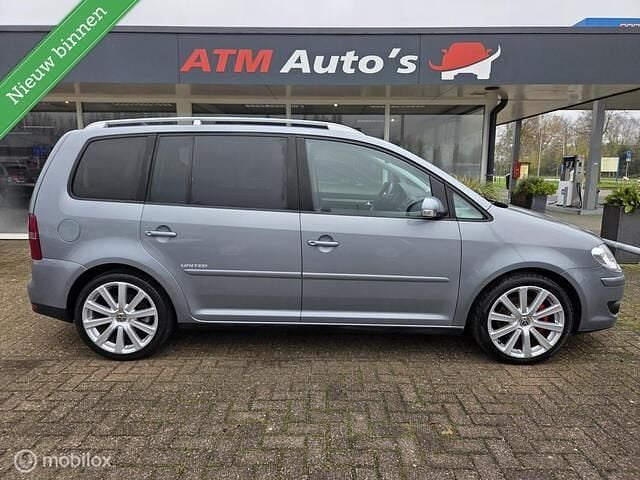 Grijs Gebruikt 2008 VW Touran Highline MPV | € 5.450 (Eerlijke prijs) - Afbeelding 1/4