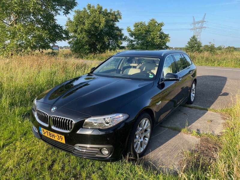Zwart Gebruikt 2014 BMW 520 Luxury Line Stationwagen | € 10.499 (Goede deal) - Afbeelding 1/4