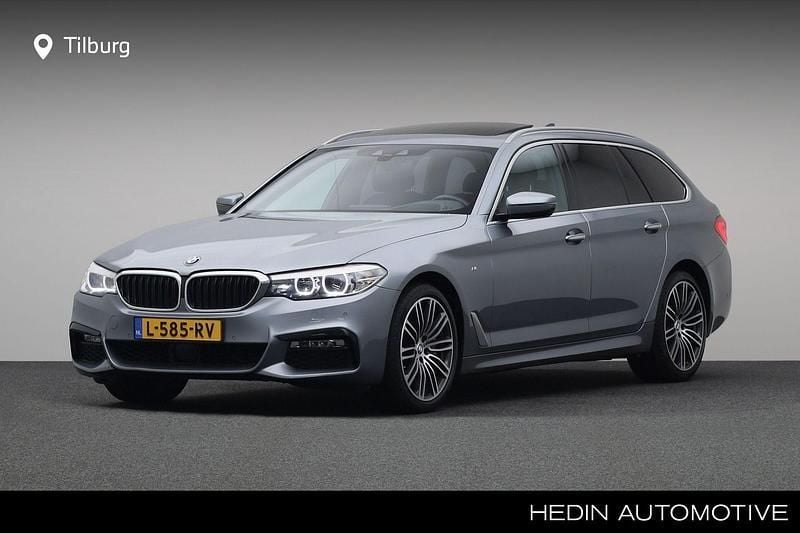 Grijs, metallic lak Gebruikt 2017 BMW 530 Executive Stationwagen | € 31.880 (Eerlijke prijs) - Afbeelding 1/4