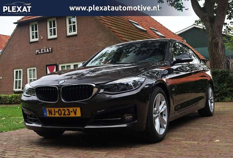 Bruin Gebruikt 2016 BMW 330 Gran Turismo Comfort Edition Hatchback | € 20.945 - Afbeelding 1/4