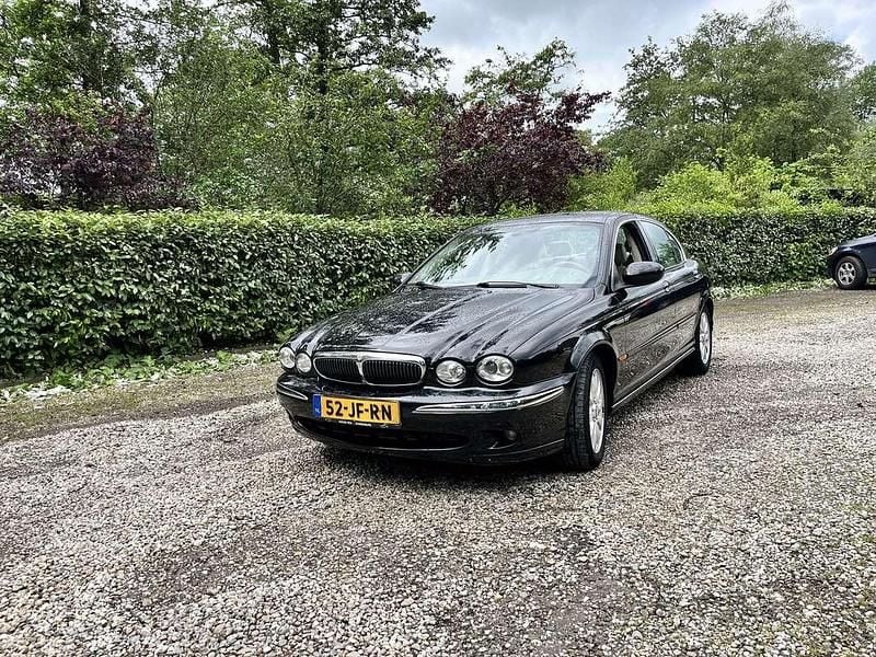Zwart Gebruikt 2002 Jaguar X-type Sedan | € 2.000 (Goede deal) - Afbeelding 1/4