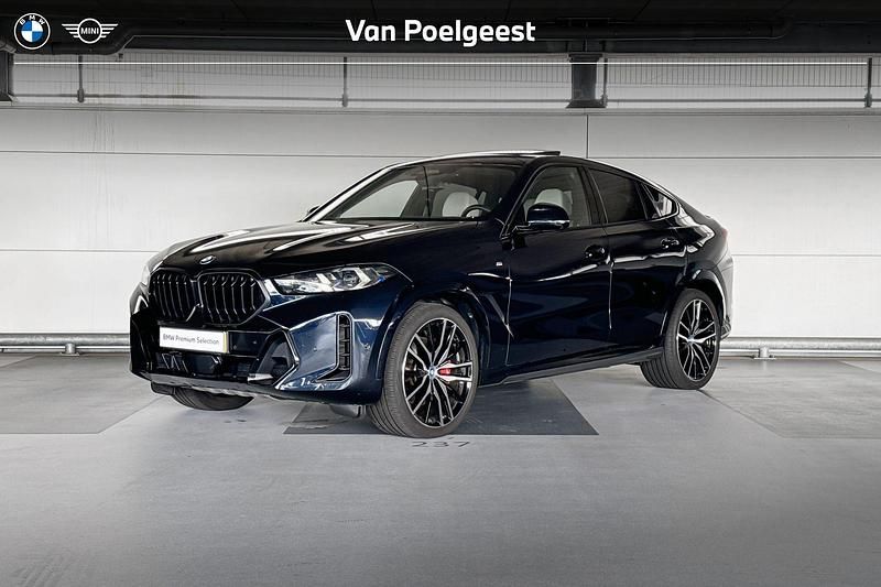 M carbonschwarz Gebruikt 2024 BMW X6 Comfort Edition SUV | € 113.900 - Afbeelding 1/4