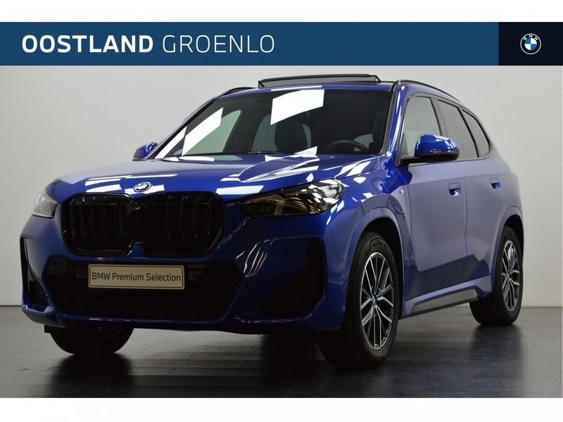 M portimao blau (blauw metallic) Gebruikt 2024 BMW X1 Comfort Edition SUV | € 53.950 (Duur) - Afbeelding 1/4