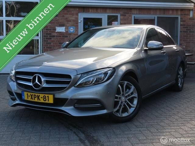 Grijs, metallic lak Gebruikt 2014 Mercedes C180 Ambition Sedan | € 9.950 (Eerlijke prijs) - Afbeelding 1/4