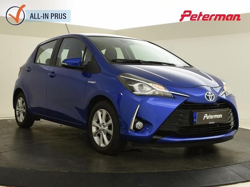 Blauw Occasion 2019 Toyota Yaris Hybrid Hatchback | € 14.899 (Super prijs) - Afbeelding 1/4