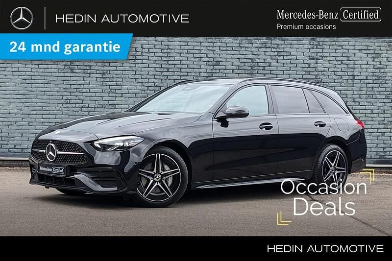 Zwart, metallic lak Occasion 2023 Mercedes C300e AMG line Stationwagen | € 41.490 (Eerlijke prijs) - Afbeelding 1/3